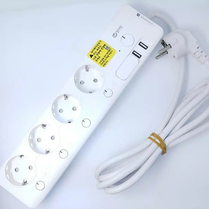 White power strip with multiple outlets and USB ports on a light gray background