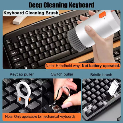 Keyboard cleaning brush set with keycap puller, switch puller, and bristle brush on a keyboard.