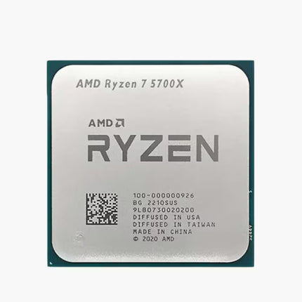 AMD Ryzen 7 5700X processor chip with a silver metal top and dark teal pins, shown on a light gray background.