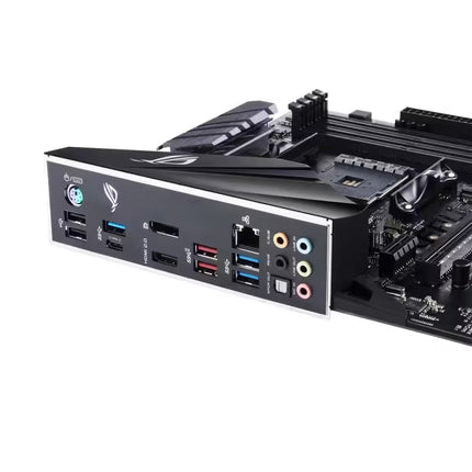 A close-up of a black ASUS motherboard rear I/O panel showing various ports including USB 3.0, USB 2.