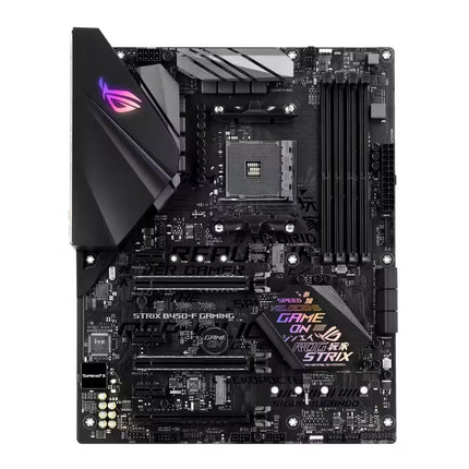 ASUS ROG Strix B450-F Gaming motherboard in black with silver and purple RGB accents, shown from a top-down view on a white background.