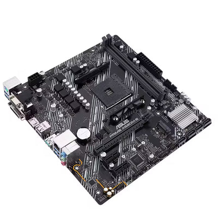 Top perspective of the ASUS PRIME A520M-E motherboard showing the AM4 processor socket, dual DDR4 memory slots, PCIe expansion slots, chipset heatsink, rear I/O ports, and clean black-and-white PCB design.