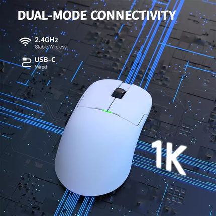 White computer mouse with dual-mode connectivity features on a blue circuit board background