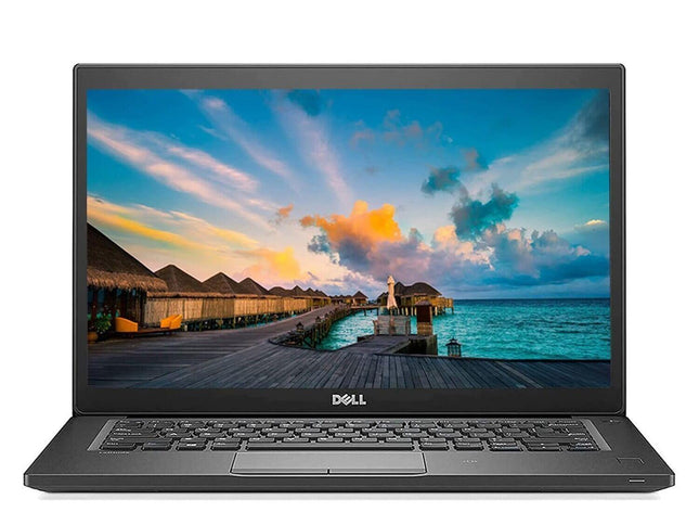 Laptop displaying a scenic wallpaper on a white background