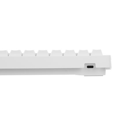 White plastic strip with a small hole on a white background