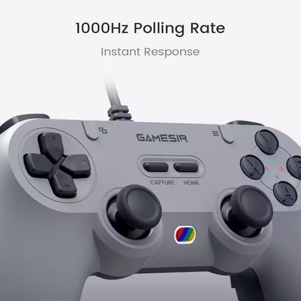 A close-up of a gray GAMESIR game controller on a light gray background, with text above reading '1000Hz Polling Rate' and 'Instant Response.' The controller has black buttons and joysticks, a small multicolor logo near the bottom center, and a white cable visible at the top.