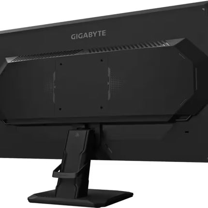 Rear view of a Gigabyte gaming monitor from a right-side angle, showcasing the textured back chassis.