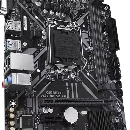 Gigabyte H310M S2.0 motherboard in black with gray and white accents, featuring an LGA 1200 CPU socket, DDR4 RAM slots, and various I/O ports on the left side.