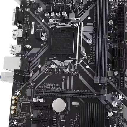 Gigabyte H310M S2 2.0 LGA1151 desktop motherboard in black and gray with silver accents, shown from a top-down angle on a white background.