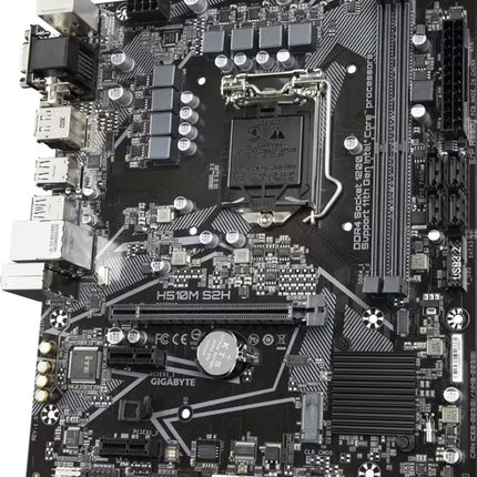 Angled view of the GIGABYTE H510M S2H motherboard highlighting the Intel LGA1200 socket, dual DDR4 memory slots, PCIe expansion slots, SATA ports, and compact Micro-ATX layout.