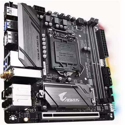 Angled perspective of the Gigabyte Z390 AORUS PRO WiFi Mini-ITX motherboard, showcasing the Intel LGA 1151 socket, dual DDR4 DIMM slots, PCIe x16 slot, silver AORUS heatsinks, integrated Wi-Fi module, SATA ports, and RGB lighting accents.