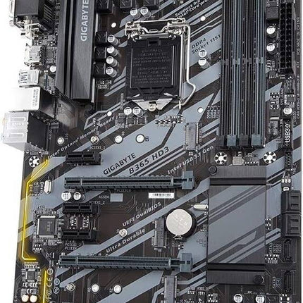 Gigabyte motherboard with various components on a black background