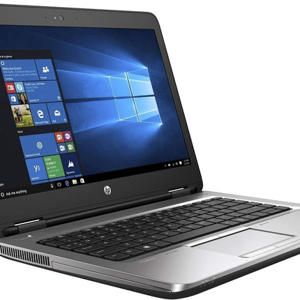 Open laptop displaying a Windows operating system on a white background