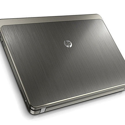 Silver HP laptop on a white background