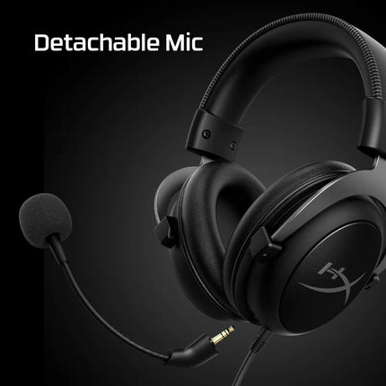 Black gaming headset with detachable mic on a dark background
