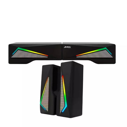 Gaming monitor and speakers with RGB lighting on a white background