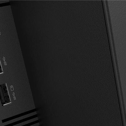 Close-up of a black electronic device with ports on a white background