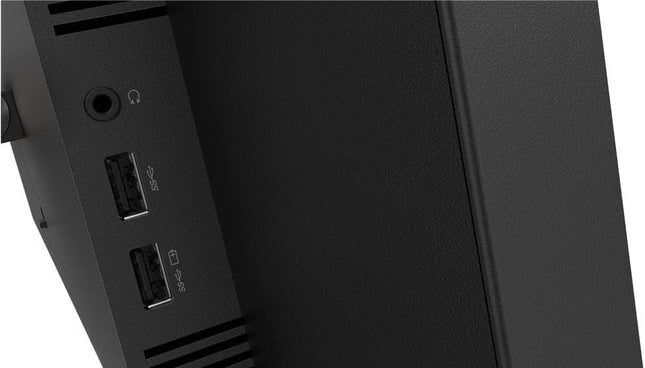 Close-up of a black electronic device with ports on a white background