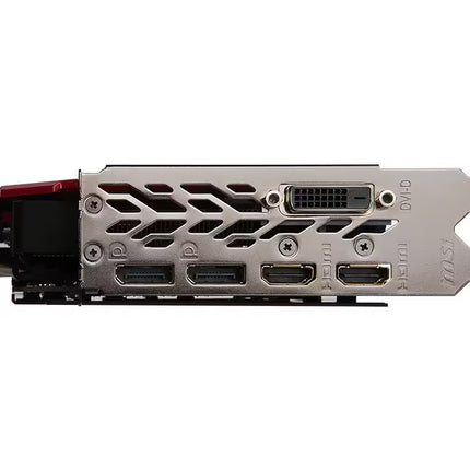 A close-up side view of a graphics card backplate showing multiple output ports including DVI and HDMI, with a silver metal casing and a small red accent visible on the left.