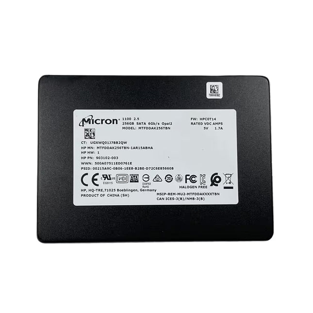 A black rectangular Micron SSD battery with a white product specification label on the front, photographed against a solid white background.