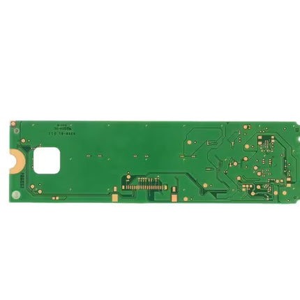 Back view of a Micron 2200S 256GB M.2 NVMe SSD showing the green PCB and M.2 connector on a white background.