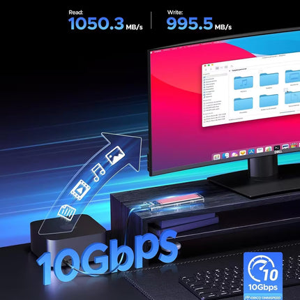 Computer monitor with file transfer speed display on a desk