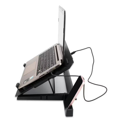Laptop on a black stand with a cable on a white background