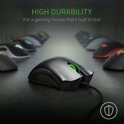 Gaming mouse with high durability text on a dark background