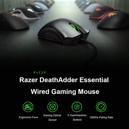 Razer DeathAdder Essential gaming mouse on a dark surface with Razer branding.