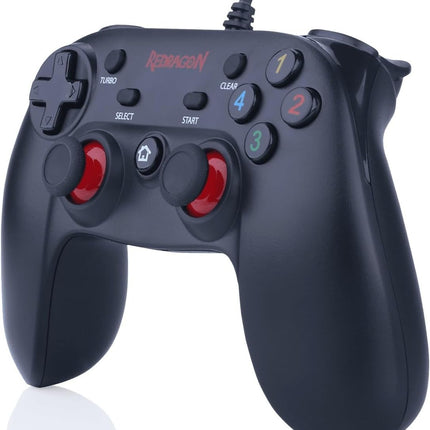 Black gaming controller with red accents on a white background