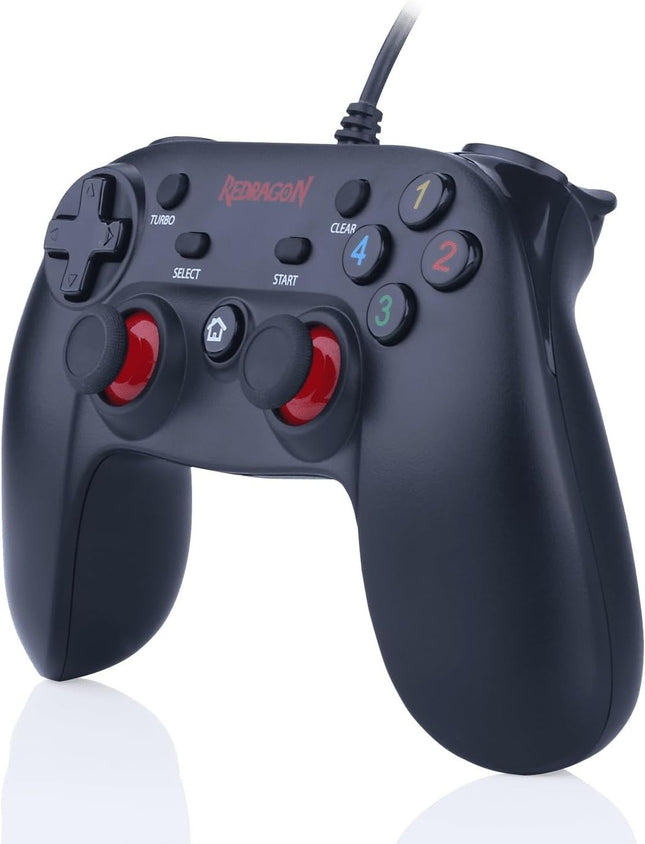 Black gaming controller with red accents on a white background