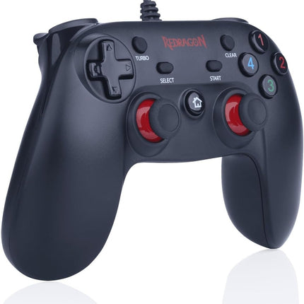 Black gaming controller with red buttons on a white background
