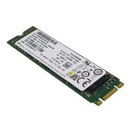 Angled view of the SK hynix SC311 128GB M.2 2280 SATA SSD showing the front side with product label and M.2 SATA connector.
