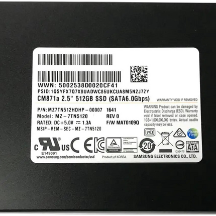 Rear view of a Samsung 2.5-inch SATA III internal SSD featuring a black metal casing and a white identification label with product specifications, regulatory markings, and 512GB capacity. Displayed on a white background.