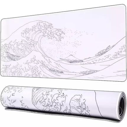 A rectangular gaming or desk mat featuring a black line art print of 'The Great Wave off Kanagawa' on a white background, shown both flat and rolled up.