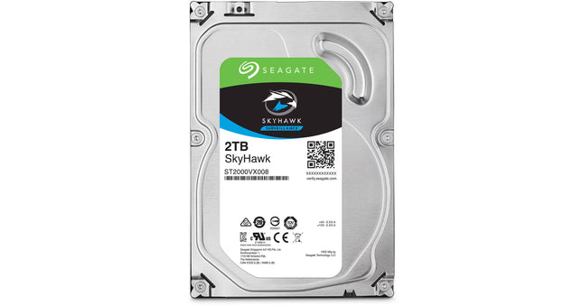 A Seagate Skyhawk 2TB enterprise hard drive with a silver metal casing and a white, green, and black product label.