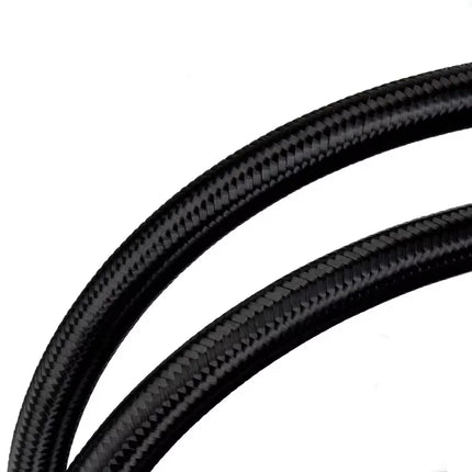 Close-up of two black braided cords with a carbon-fiber-like woven texture on a plain white background.