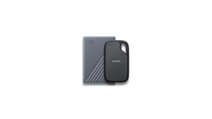 Two external hard drives, one gray and one black, on a white background.