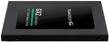Low-angle perspective of the TeamGroup GX2 128GB 2.5-inch SATA III internal SSD, showing the black metal housing, front label, slim profile, and side mounting holes against a white background.