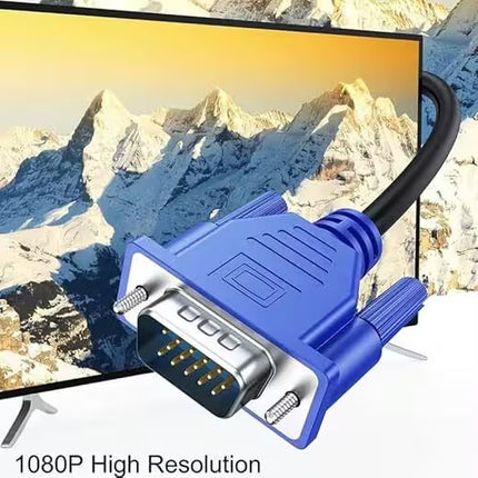 Blue VGA cable in front of a monitor displaying a mountainous landscape