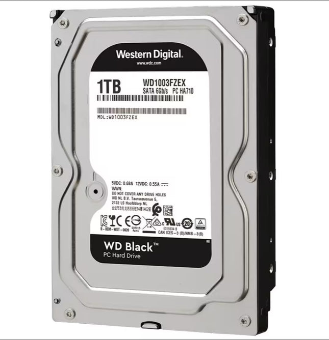 Angled front view of a Western Digital Black 1TB 3.5-inch internal hard disk drive (HDD) with a silver metal enclosure and product label against a white background.