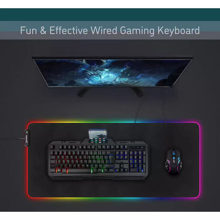 Gaming setup with keyboard, mouse, and monitor on a dark surface