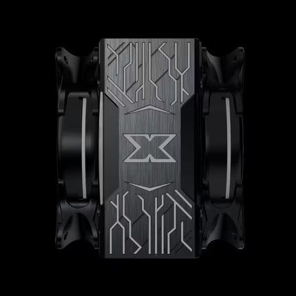 A top-down view of a black and dark gray computer cooling heatsink with intricate geometric silver patterns and a stylized 'X' logo in the center, flanked by two black fans.