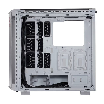 White empty computer case interior showing the rear panel with black cable management, mounting slots, and a large square cutout on a white background.