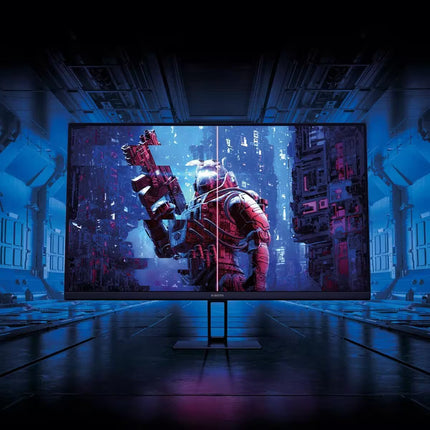 Large screen displaying a futuristic robot in a sci-fi setting with blue lighting.