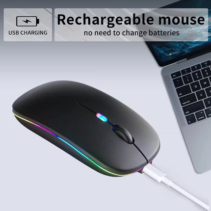Rechargeable mouse with USB charging cable on a laptop background