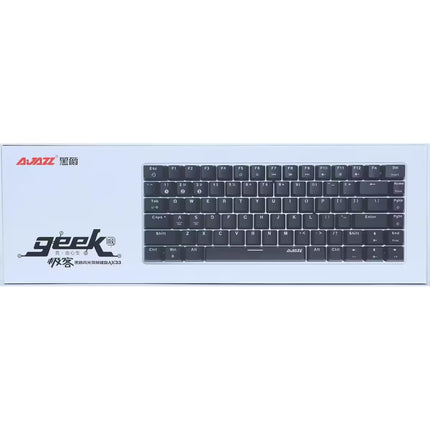 A compact black mechanical keyboard inside its white retail packaging box, featuring the brand name 'Geek' and Chinese characters on the left side of the box.