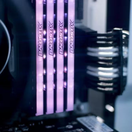 Close-up of a computer motherboard with purple LED lights and 'Palit' branding.