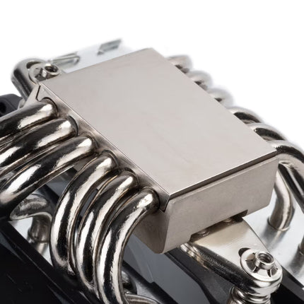 Close-up of a metallic bracelet with coiled design on a white background