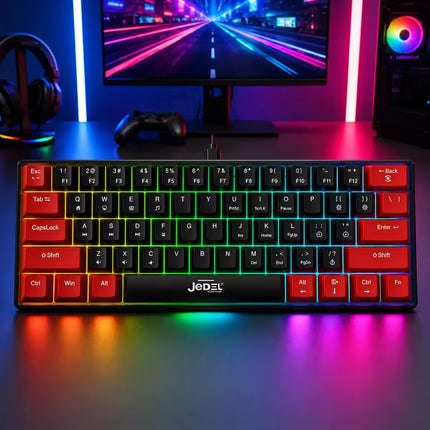 A JEDF mechanical gaming keyboard with a black and red key layout, illuminated by vibrant RGB backlighting, set on a desk with a monitor, headphones, and gaming accessories in a neon-lit room.
